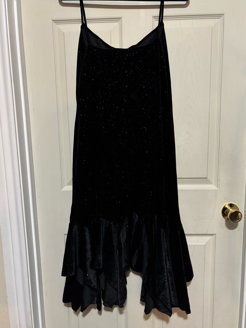 Onyx night vintage slip dress featuring a sparkly bodice and handkerchief hem